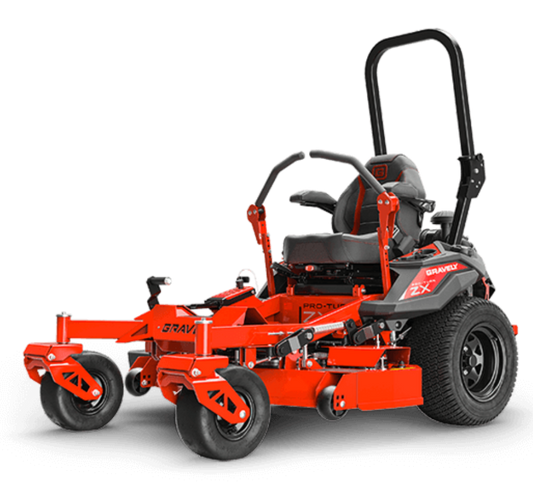 Red zero-turn lawn mower on a black background