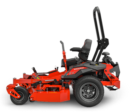 Red zero-turn lawn mower on a black background
